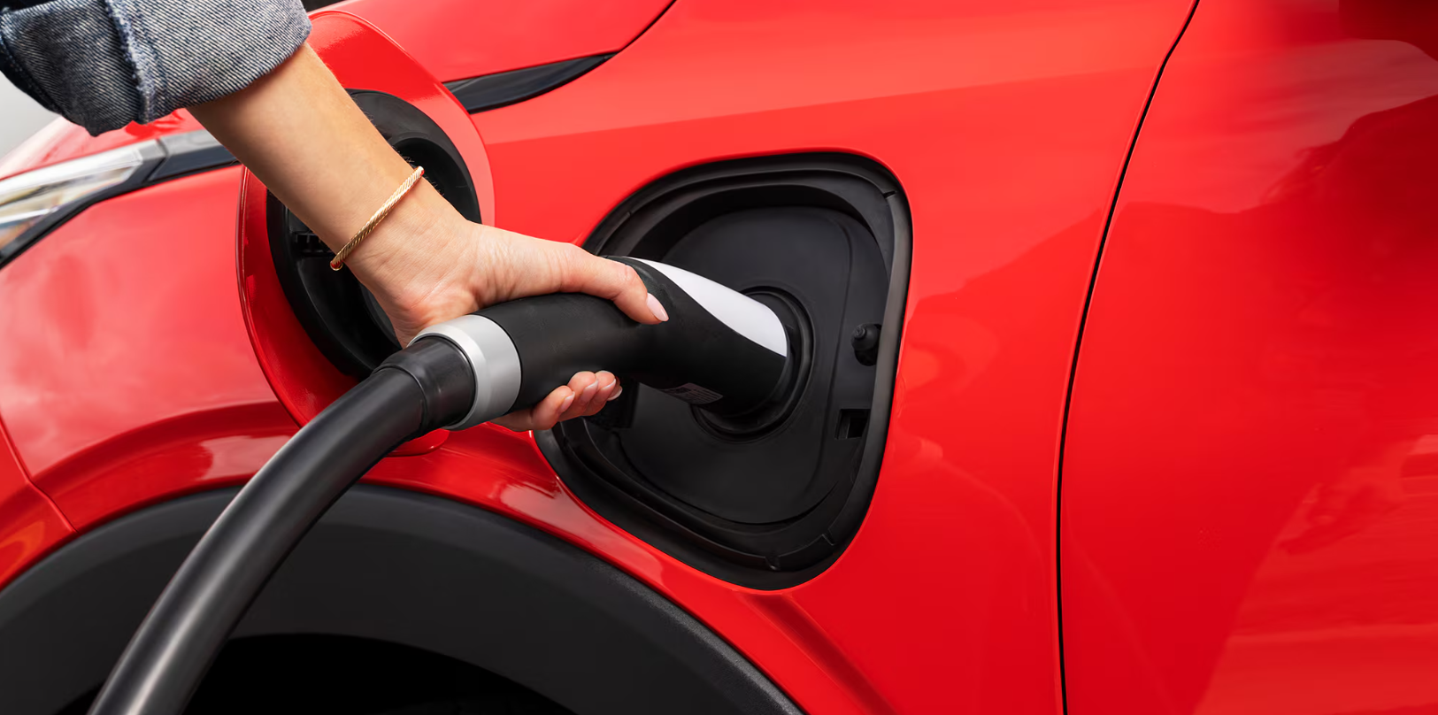 Charging the 2027 Chevrolet Bolt at a fast-charging station