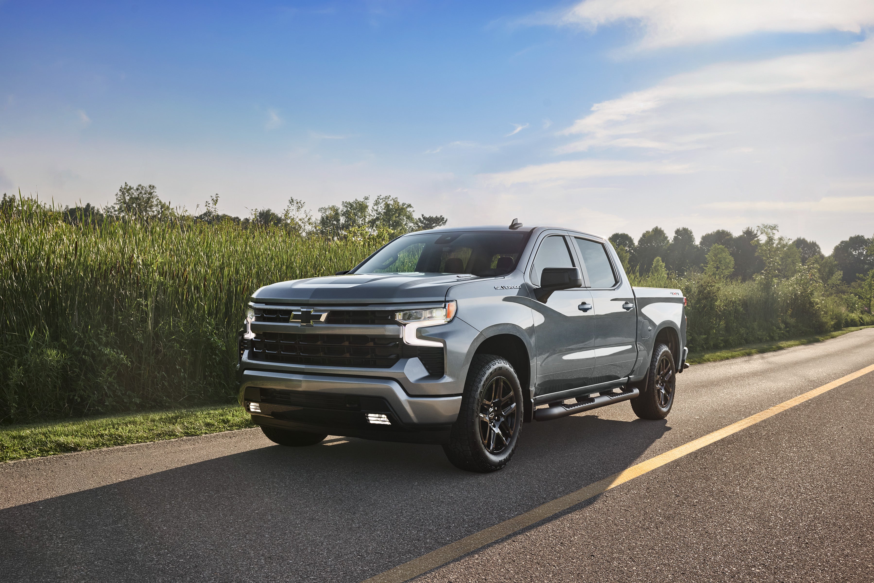 The 2026 Chevrolet Silverado 1500 driving on road