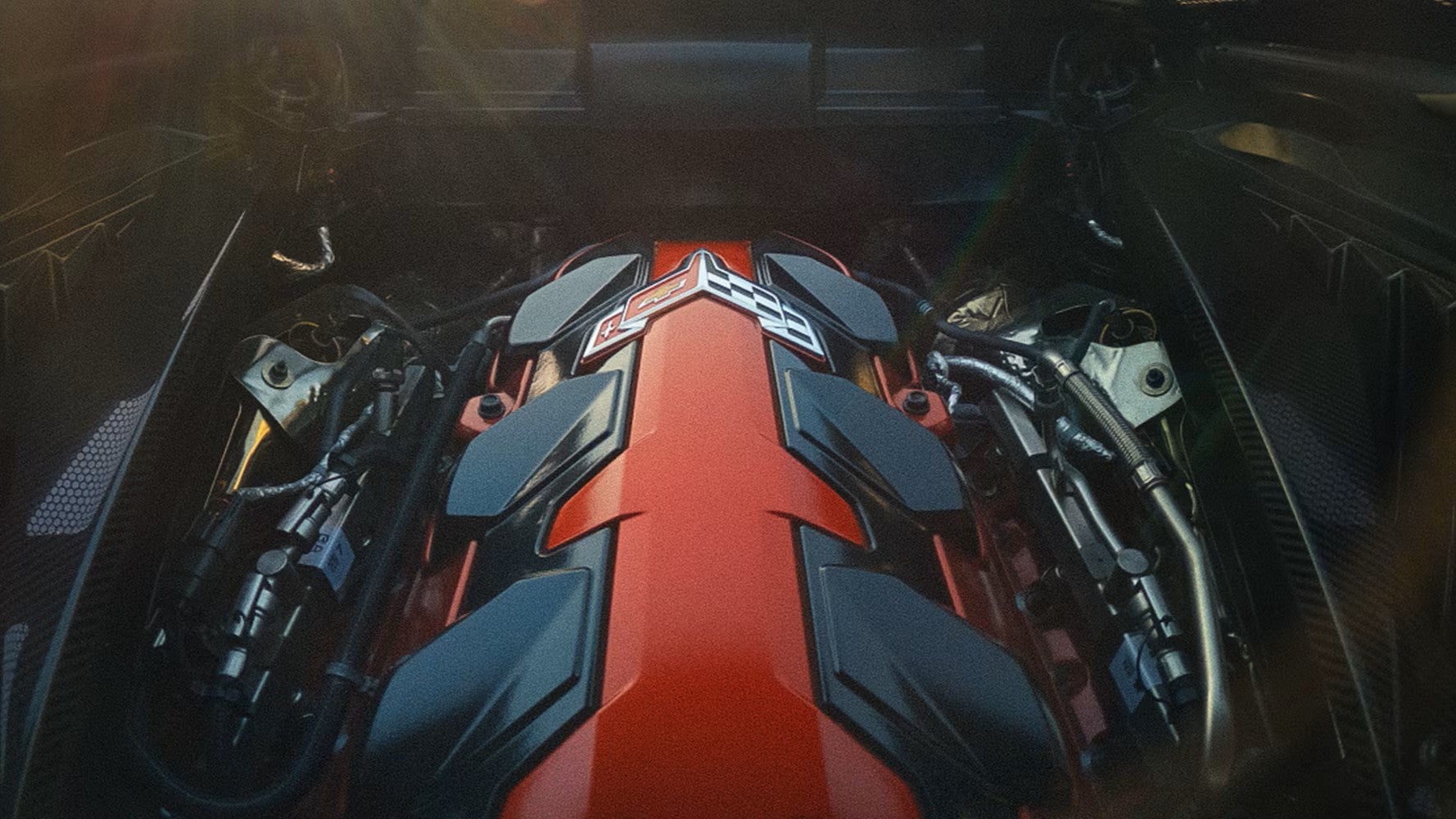 2027 Chevrolet Corvette Grand Sport engine bay and mid-engine layout highlighting the new LS6 V8 engine