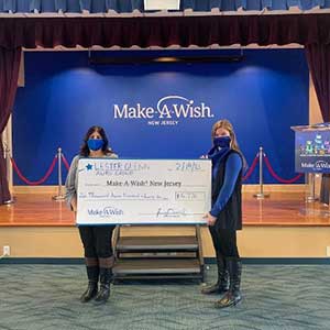 Lester Glenn donating to the Make a Wish Foundation