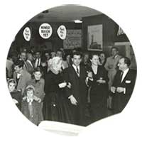 A photograph of the Lester Glenn grand opening in 1956